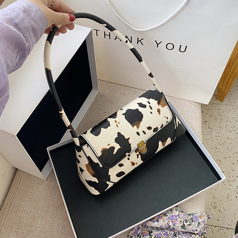 Stylish one-shoulder cow bag